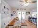 Dining room with backyard access and breakfast bar looking into kitchen at 335 Linda St, Salisbury, NC 28146