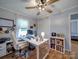 Well-lit office space with white desk and shelving, offering a functional and organized work environment at 335 Linda St, Salisbury, NC 28146