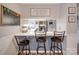 Breakfast bar with seating connects the dining room to the kitchen at 335 Linda St, Salisbury, NC 28146