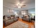 Comfortable living room with a large window and hardwood floors at 335 Linda St, Salisbury, NC 28146