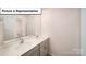 Bathroom featuring a double sink vanity with modern fixtures at 3412 Lacebark Ln, Gastonia, NC 28056