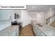 Modern kitchen featuring granite countertops, stainless steel appliances, and ample cabinet space at 3412 Lacebark Ln, Gastonia, NC 28056