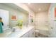 Bright bathroom featuring double sink vanity with quartz countertops and a tub and shower combination at 3414 Lacebark Ln, Gastonia, NC 28056