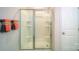 Modern stand up shower with built-in shelving and sliding door with matching towel rack at 3414 Lacebark Ln, Gastonia, NC 28056