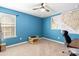 Bedroom features a desk, chair, and a colorful state map at 3424 Windstone Ln, Gastonia, NC 28056