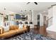 Open concept living room connects to modern kitchen with stylish bar seating at 3424 Windstone Ln, Gastonia, NC 28056