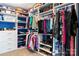 Walk-in closet featuring custom shelving and racks for organized clothing and shoes at 3424 Windstone Ln, Gastonia, NC 28056