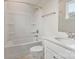Bright bathroom featuring a shower-tub combo, tile floors, and modern fixtures for a relaxing experience at 355 S Bruns Ave, Charlotte, NC 28208