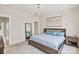 Relaxing bedroom with carpet floor, natural light, a queen bed, and a ceiling light fan at 355 S Bruns Ave, Charlotte, NC 28208
