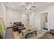Comfortable living room with a ceiling fan, stylish decor, and easy access to other areas of the home at 355 S Bruns Ave, Charlotte, NC 28208