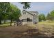 Back exterior view showing the new deck and the home's rear elevation at 4006 Scarlet Dr # 29, Matthews, NC 28104