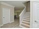 A spacious entryway and wood stairs at 4006 Scarlet Dr # 29, Matthews, NC 28104