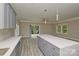 The kitchen has gray cabinets with stainless appliances and lots of natural light at 4006 Scarlet Dr # 29, Matthews, NC 28104