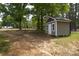 Outbuilding in a spacious backyard with tree coverage at 4006 Scarlet Dr # 29, Matthews, NC 28104