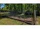 Fenced in area in the backyard with a gate at 403 3Rd Nw St, Conover, NC 28613