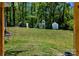 Spacious backyard with playground and storage shed, perfect for to play at 403 3Rd Nw St, Conover, NC 28613