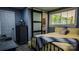 This cozy bedroom offers warm lighting, a decorative sliding door to bathroom, and neutral color tones at 403 3Rd Nw St, Conover, NC 28613