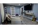 Inviting living room with modern gray walls, wood floors, and ample seating at 403 3Rd Nw St, Conover, NC 28613