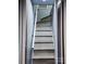 This gray staircase features clean lines and minimalist design, enhancing the transition between levels with simplicity at 403 3Rd Nw St, Conover, NC 28613
