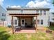 Back patio with pergola, furniture and view of the house at 4148 Shasta Cir, Clover, SC 29710