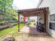 Backyard features a pergola, a small shed, and terraced landscaping at 4148 Shasta Cir, Clover, SC 29710