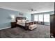 Spacious bedroom features a large bed, a ceiling fan, and lots of natural light at 4148 Shasta Cir, Clover, SC 29710