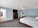 The main bedroom has grey carpet, light blue walls, and multiple doorways at 4148 Shasta Cir, Clover, SC 29710