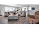 Open-concept living room with comfortable seating, a neutral palette, and plenty of natural light at 4148 Shasta Cir, Clover, SC 29710