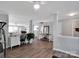 Bright and airy living room featuring wood floors, white trim, and plenty of space to relax at 4148 Shasta Cir, Clover, SC 29710