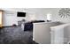 Open loft space with comfortable seating, media console, and neutral decor at 4148 Shasta Cir, Clover, SC 29710