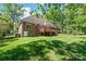 Beautiful brick house with spacious backyard and outdoor deck at 4232 Shannamara Dr, Matthews, NC 28104