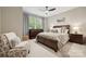 A serene bedroom features neutral paint, ceiling fan, and neutral carpet at 425 W North Corner Rd, Lancaster, SC 29720