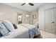 This cozy bedroom featuring soft carpet and a hallway to a stylish bathroom at 425 W North Corner Rd, Lancaster, SC 29720