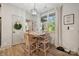 Cozy dining area with natural lighting and wood floors, perfect for casual meals at 425 W North Corner Rd, Lancaster, SC 29720