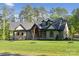 Beautiful single-Gathering home featuring a well-manicured lawn and craftsman design at 425 W North Corner Rd, Lancaster, SC 29720