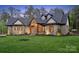 Charming craftsman-style home with a well-maintained lawn and inviting curb appeal at 425 W North Corner Rd, Lancaster, SC 29720