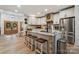 Open kitchen featuring a granite island with seating and stainless steel appliances at 425 W North Corner Rd, Lancaster, SC 29720