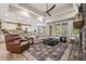 Spacious living area with wood floors, comfortable seating, and an open-concept design at 425 W North Corner Rd, Lancaster, SC 29720