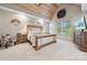Cozy main bedroom featuring carpet floors, a wood-trimmed bed, and vaulted wood ceilings at 425 W North Corner Rd, Lancaster, SC 29720