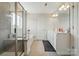 Bathroom featuring a tub with shower, large mirror and double sinks at 4321 Hornyak Dr, Monroe, NC 28110