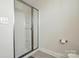 Bathroom showcasing a standing shower with neutral walls at 4321 Hornyak Dr, Monroe, NC 28110