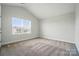 Bedroom featuring neutral walls and carpet with a large window at 4321 Hornyak Dr, Monroe, NC 28110