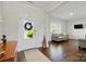 Inviting foyer with hardwood floors, natural light, and a view into the adjacent living spaces at 4321 Hornyak Dr, Monroe, NC 28110