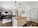 Bright kitchen with center island that opens up to the dining and living rooms at 4321 Hornyak Dr, Monroe, NC 28110