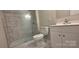 Modern bathroom featuring tiled shower and a sleek vanity with updated fixtures at 440 27Th Street Sw Pl, Hickory, NC 28602
