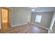 Clean and bright bedroom featuring neutral walls and vinyl floors at 440 27Th Street Sw Pl, Hickory, NC 28602