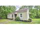 Charming single-story home with tan siding and a well-manicured front yard at 440 27Th Street Sw Pl, Hickory, NC 28602