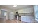 Stylish kitchen with white cabinets, stainless appliances, and modern countertops at 440 27Th Street Sw Pl, Hickory, NC 28602