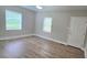 Bright living room with new vinyl floors, modern lighting, and fresh paint at 440 27Th Street Sw Pl, Hickory, NC 28602