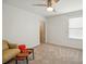 A room with white walls, a couch and a small table at 4506 S Potter Rd, Monroe, NC 28112